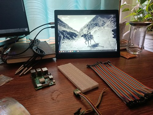 20 May 2026 — A Raspberry Pi 4, a breadboard and a ribbon of jumper wires. On the monitor, a photograph of Dho Tarap, Dolpo.